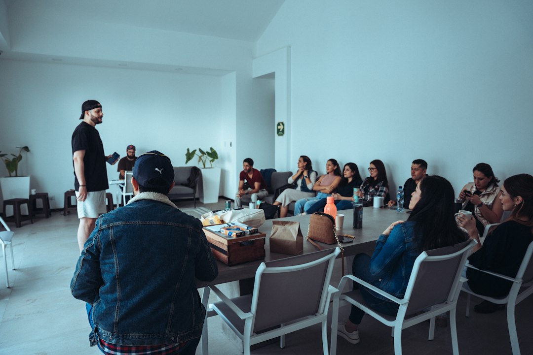 HOA board members seated around a table discussing community business